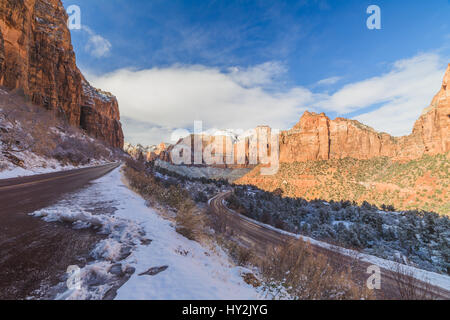 Snowy roads and blue skies at Zion National Park in southwest Utah, USA. Stock Photo