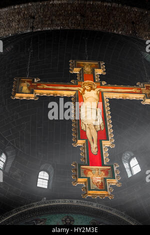 A crucifix above the main altar in the sanctuary at the Catholic cathedral at Westminster, London, England. Stock Photo