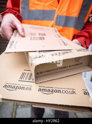 Amazon parcels being delivered Stock Photo
