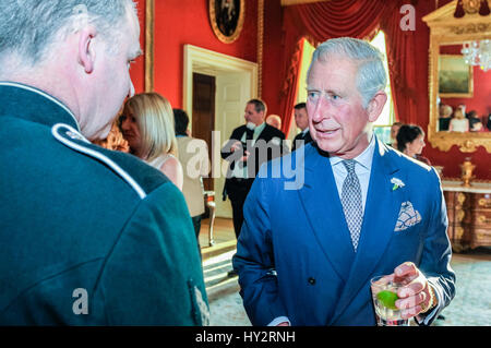 HILLSBOROUGH, NORTHERN IRELAND. 24 MAY 2016: HRH Prince Charles, the Prince of Wales, chats to guests in Hillsborough Palace.