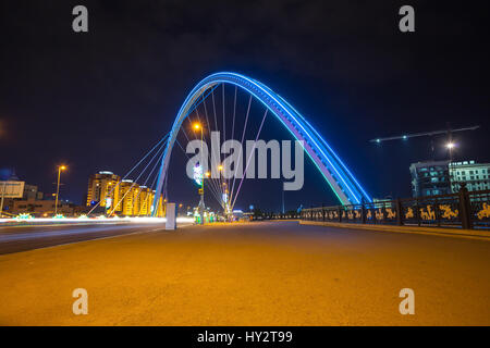 The bridge in Astana at night, in the capital of Kazakhstan Stock Photo