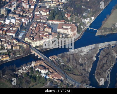 Aerial view of Cassano d'Adda with the Adda River flowing near the castle. Stock Photo