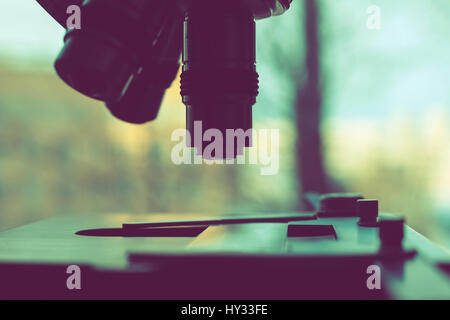 Laboratory Equipment - Optical Microscope. Photo of a medical microscope close-up Stock Photo