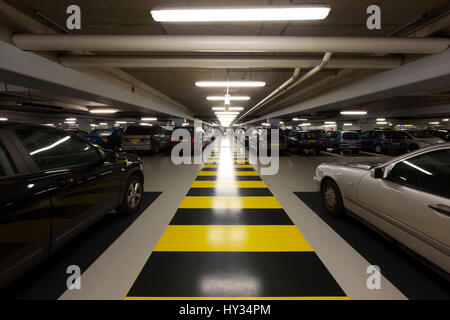 Floor markings in an new indoor car parking. Stock Photo