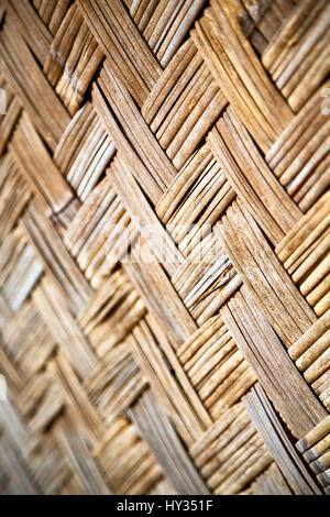 a wall build on wicker bamboo like abstract vintage surface Stock Photo
