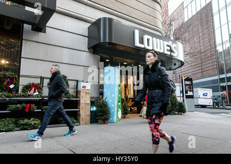 New York, November 28, 2016: People walk by the entrance to a Lowe's home improvement store on Upper West Side. Stock Photo