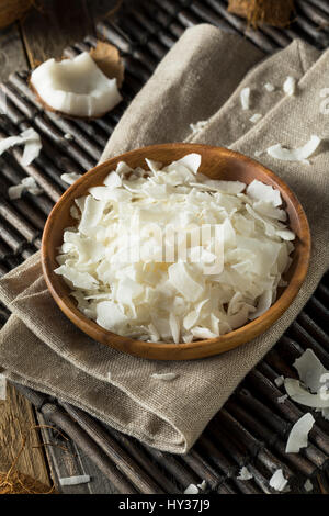 Raw Organic Coconut Flakes in a Bowl for Baking Stock Photo