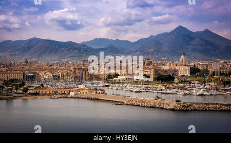 Italy, Sicily, Palermo, Waterfront of island city and mountains in background