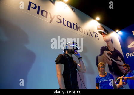 A man tries on virtual reality glasses during the celebration of the first  edition of the Meta World Congress, at La Nave, on April 1, 2023, in Madrid  (Spain). This technological congress