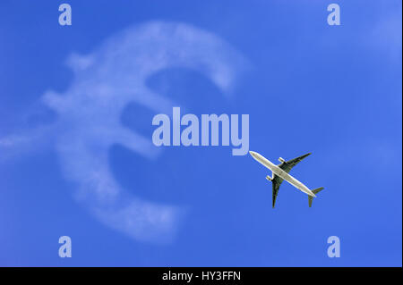 Airplane in the sky and eurosign, symbolic photo aerial transfer tax, Flugzeug am Himmel und Eurozeichen, Symbolfoto Luftverkehrssteuer Stock Photo