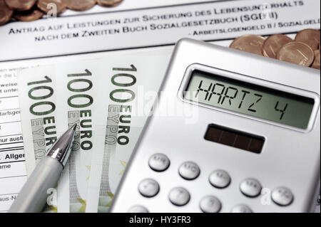 Pocket calculator with Hartz IV stroke and II application ALG, Taschenrechner mit Hartz IV-Schriftzug und ALG II-Antrag