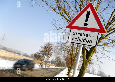 Hard winter: Warning street damages, Harter Winter: Warnschild Straßenschäden