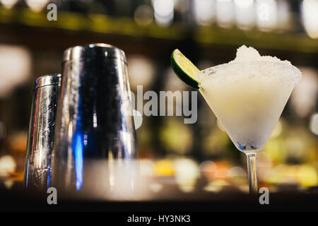 Glass of Margarita Cocktail on Crushed Ice Stock Photo