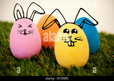 PE047 butterfly 02 bs nf against painted easter eggs arranged on grass Stock Photo