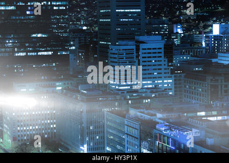 High angle view of illuminated building in city at night Stock Photo