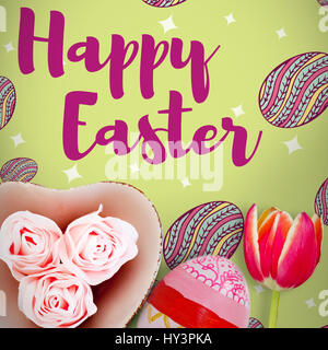 Easter greeting against painted easter eggs on white background Stock Photo