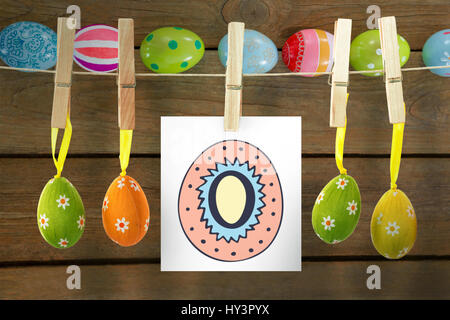 PE047 eggs 02 bs nf against painted easter eggs on wooden table Stock Photo