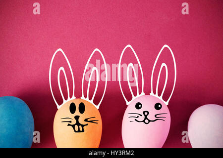 PE047 butterfly 02 bs nf against easter eggs arranged on pink background Stock Photo