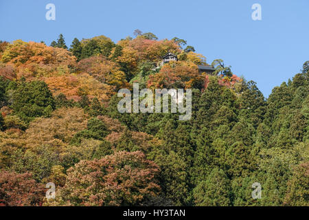 Yamadera Temple at top of mountain with autumn colour trees in Yamagata, Japan Stock Photo