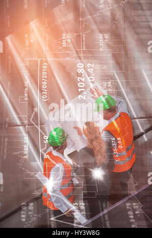 Stocks and shares against businesswoman and architects standing on staircase discussing with blue Stock Photo