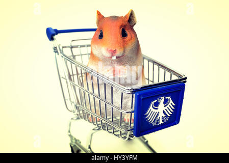 Hamster's figure in the shopping cart, symbolic photo hamster's purchases, Hamsterfigur im Einkaufswagen, Symbolfoto Hamsterkaeufe
