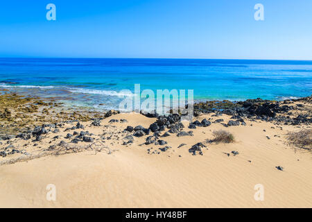 Sand dunes in Corralejo National Park and view of sea, Fuerteventura, Canary Islands, Spain Stock Photo