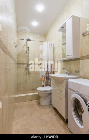Interior of a bathroom, a combined toilet and shower Stock Photo