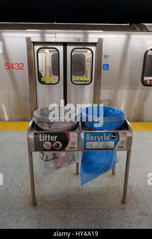 Litter, garbage, recycling bins - Museum subway station platform / metro station, TTC subway in Toronto, Ontario, Canada. Stock Photo