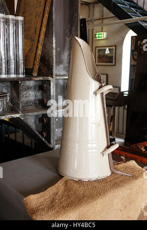 Vintage coal-scuttle, jug, on display at Coal Mine museum, Oranje Nassau, Heerlen, Limburg, Netherlands Stock Photo