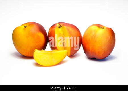 sweet freshness of nectarines, peach isolated on white background Stock Photo