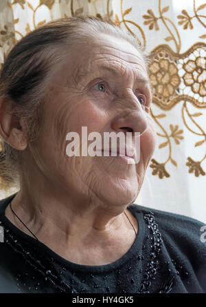 Portrait of elderly Georgian woman in Caucasus Mountains village of Ushguli, highest occupied village in Europe. Stock Photo