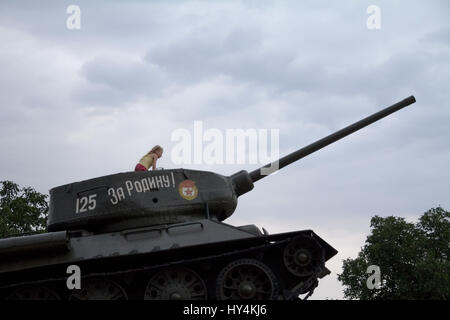 TIRASPOL, TRANSNITRIA (MOLDOVA) - AUGUST 12, 2016: Little Girl playing on the Tank Monument erected to commemorate the 1992 Transnitria civil war  Tra Stock Photo