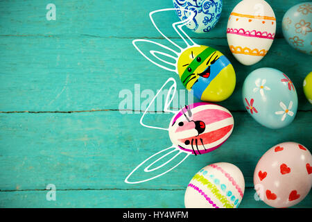 PE047 butterfly 02 bs nf against painted easter eggs on wooden plank Stock Photo