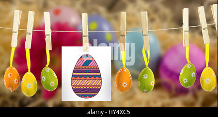 PE047 easter 01 bs nf against painted easter eggs with flower in nest Stock Photo