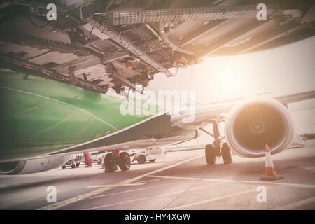 Airplane parked on airfield Stock Photo