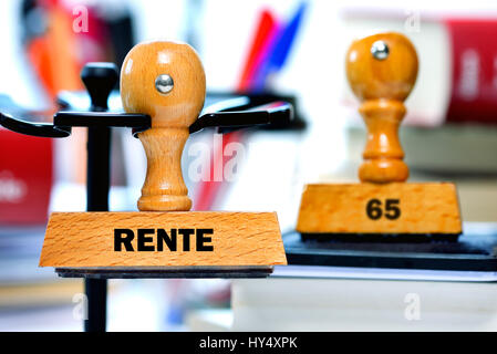 Stamp with the label Pension and 65, Stempel mit der Aufschrift Rente und 65