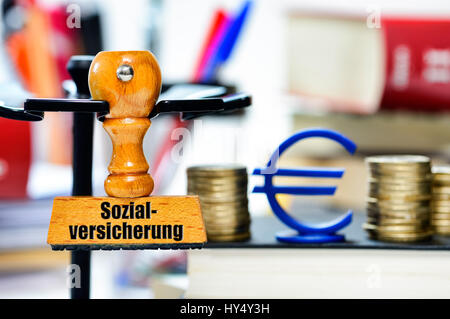 Stamp with the label Social security, Stempel mit der Aufschrift Sozialversicherung Stock Photo