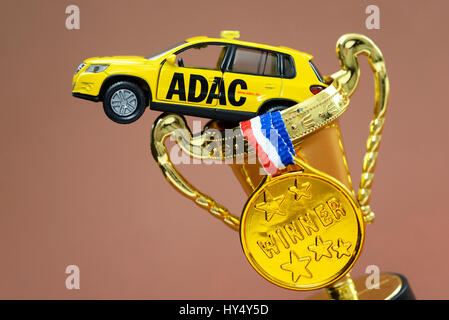 ADAC miniature vehicle, medallion and cup, manipulations with the ADAC price, ADAC Miniaturfahrzeug, Medaille und Pokal, Manipulationen beim ADAC-Prei Stock Photo