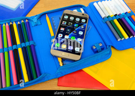 Mobile phone in a school feather pocket, Handy in einer Schulfedertasche Stock Photo