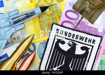 Armed forces badges on bank notes, rise of the military expenses, Bundeswehr-Abzeichen auf Geldscheinen, Erhoehung der Militaerausgaben Stock Photo