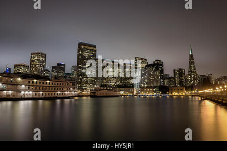 San Francisco skyline viewed from Pier 7 after sunset. Long exposure. Stock Photo