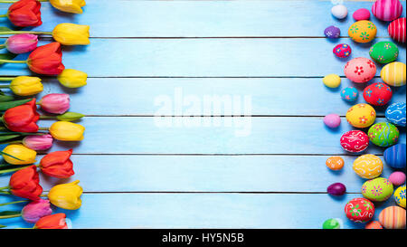 Easter - Eggs And Tulips On Blue Board Stock Photo