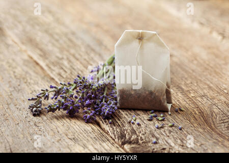 teabag with lavender on the old wooden background Stock Photo