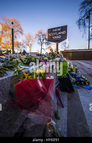 Floral tributes outside New Scotland Yard, London, following the terrorist action and death of PC Keith Palmer. Space for copy