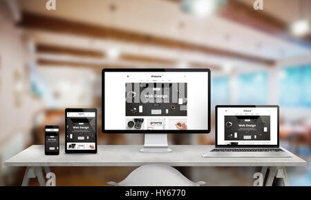 Web design studio promotion on multiple devices. Responsive web site on computer display, laptop, tablet and smart phone. Modern clean design with cle Stock Photo