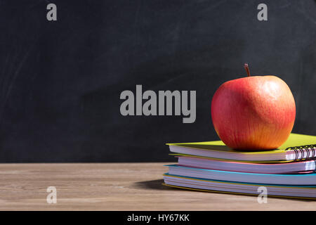 Apple On Stack Of Books - Back To School Stock Photo