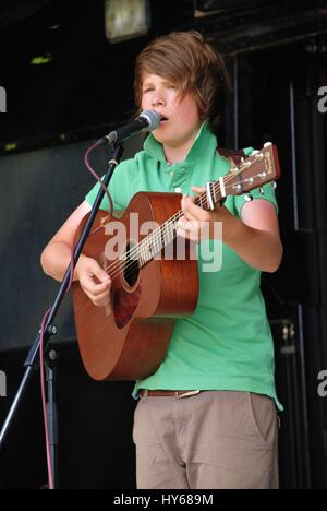 Luke Jackson, British folk and roots singer/songwriter, performs at the Tentertainment music festival at Tenterden in Kent, England on July 3, 2010. Stock Photo