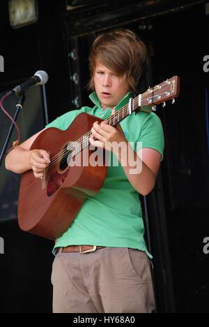 Luke Jackson, British folk and roots singer/songwriter, performs at the Tentertainment music festival at Tenterden in Kent, England on July 3, 2010. Stock Photo