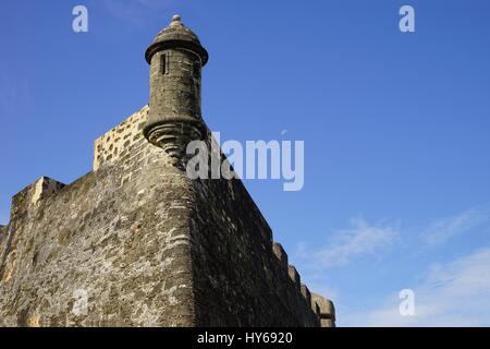 Sentry box of Castillo de San Cristobal with pale moon on the background, Puerto Rico Stock Photo