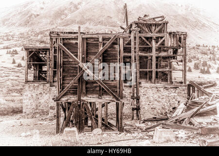 ruins of gold mine  (processing mill) near Mosquito Pass in Rocky Mountains, Colorado, retro opalotype processing Stock Photo